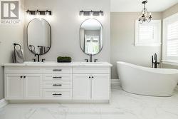 5 piece ensuite with soaker tub and heated floors -