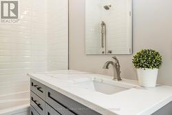 Full bathroom in second unit with heated floors -