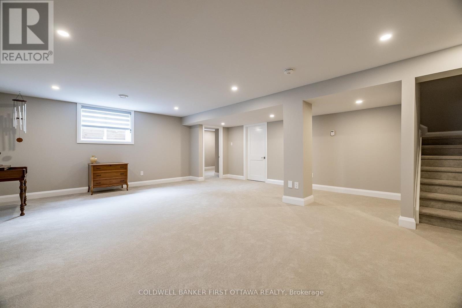 Huge recreation area with heated floors - 481 Sangeet Place, Ottawa, ON - Indoor Photo Showing Basement