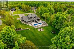 Large in ground pool, fire pit, iron fence -