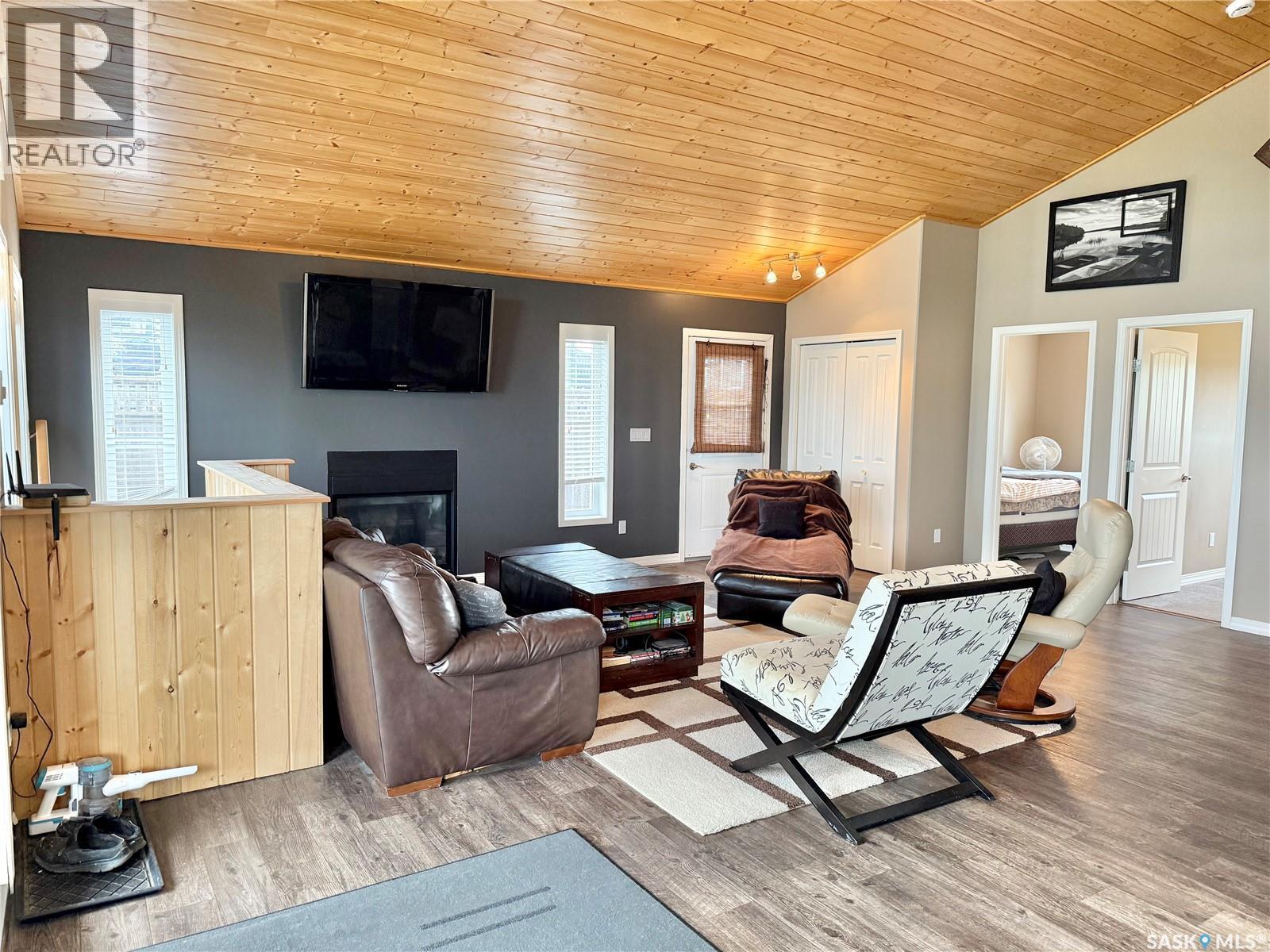 319 Ravine Road, Big Shell, SK - Indoor Photo Showing Living Room With Fireplace