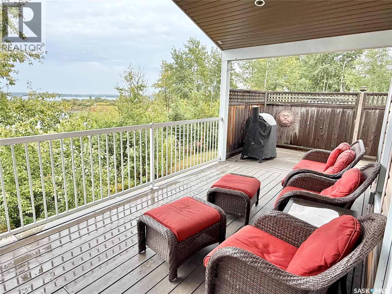 319 Ravine Road, Big Shell, SK - Outdoor With Body Of Water With Deck Patio Veranda With View With Exterior
