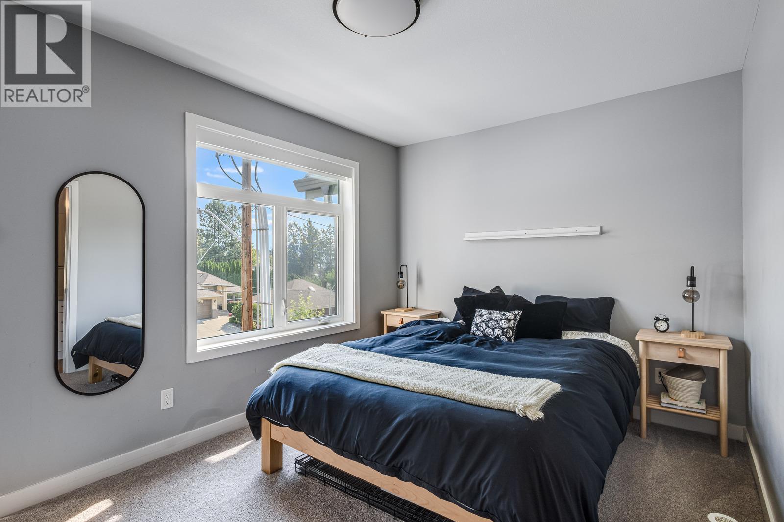 1435 Cara Glen Court Unit# 101, Kelowna, BC - Indoor Photo Showing Bedroom