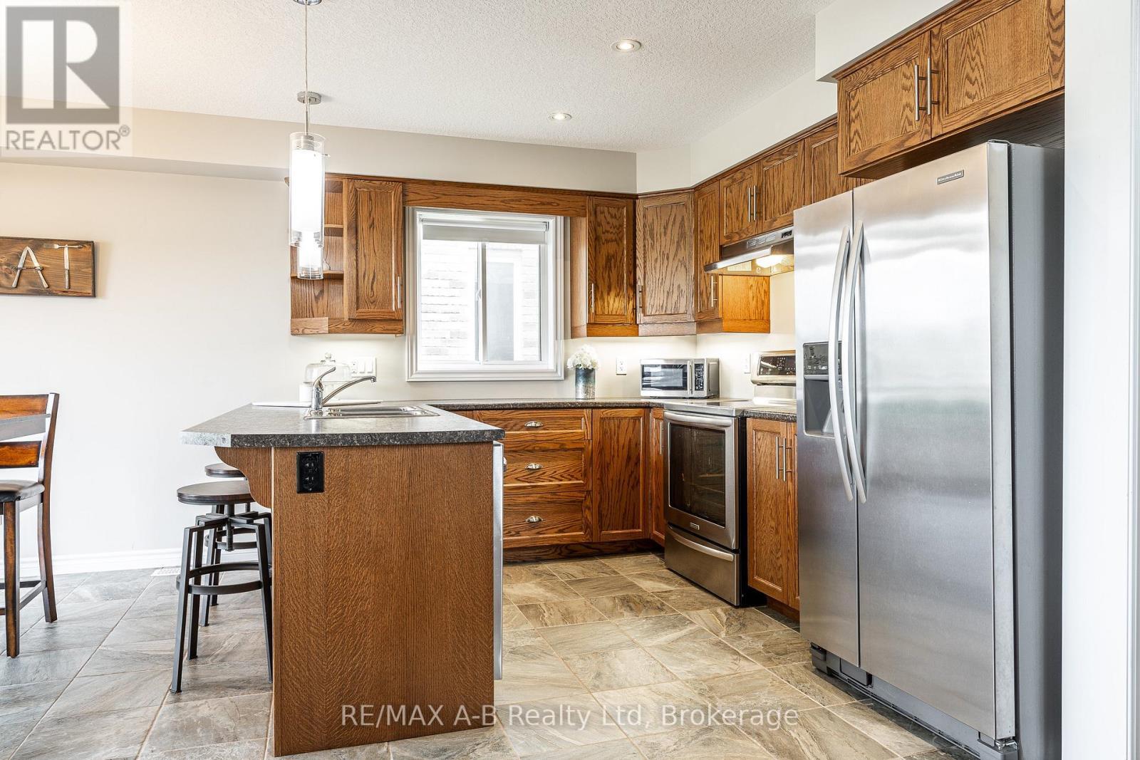 Open concept Kitchen with Stainless Appliances - 500 Forman Avenue, Stratford, ON - Indoor Photo Showing Kitchen With Stainless Steel Kitchen