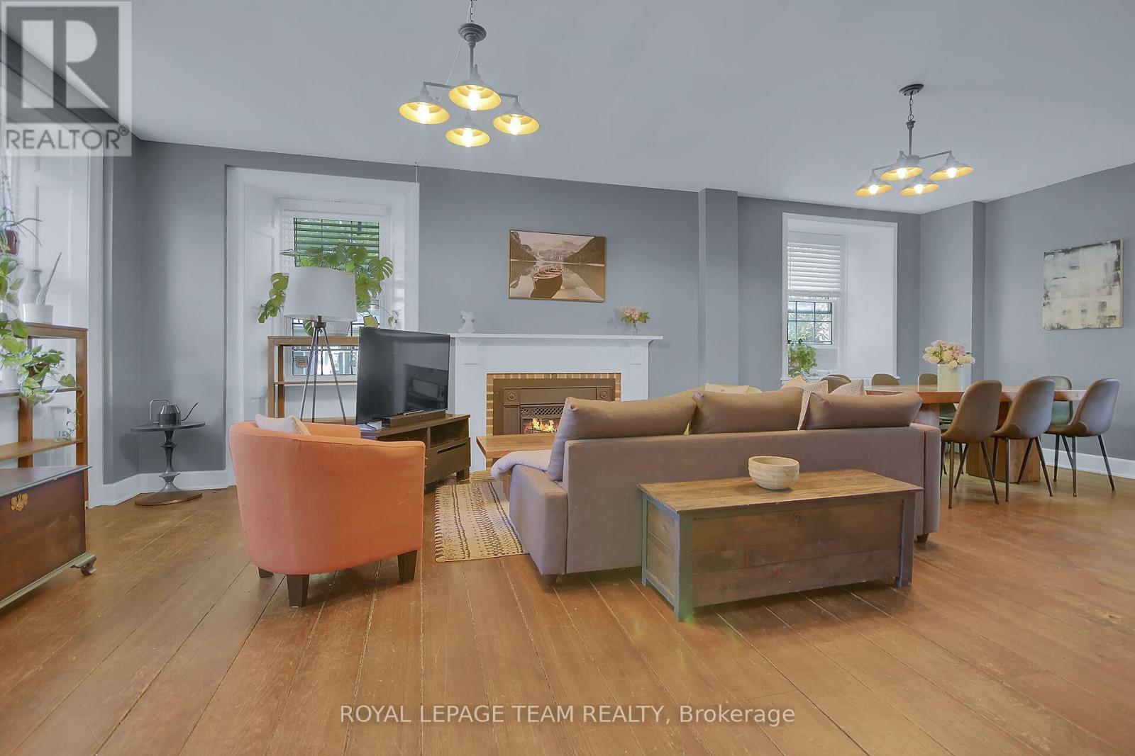 6 Spencer Street S, Edwardsburgh/Cardinal, ON - Indoor Photo Showing Living Room With Fireplace