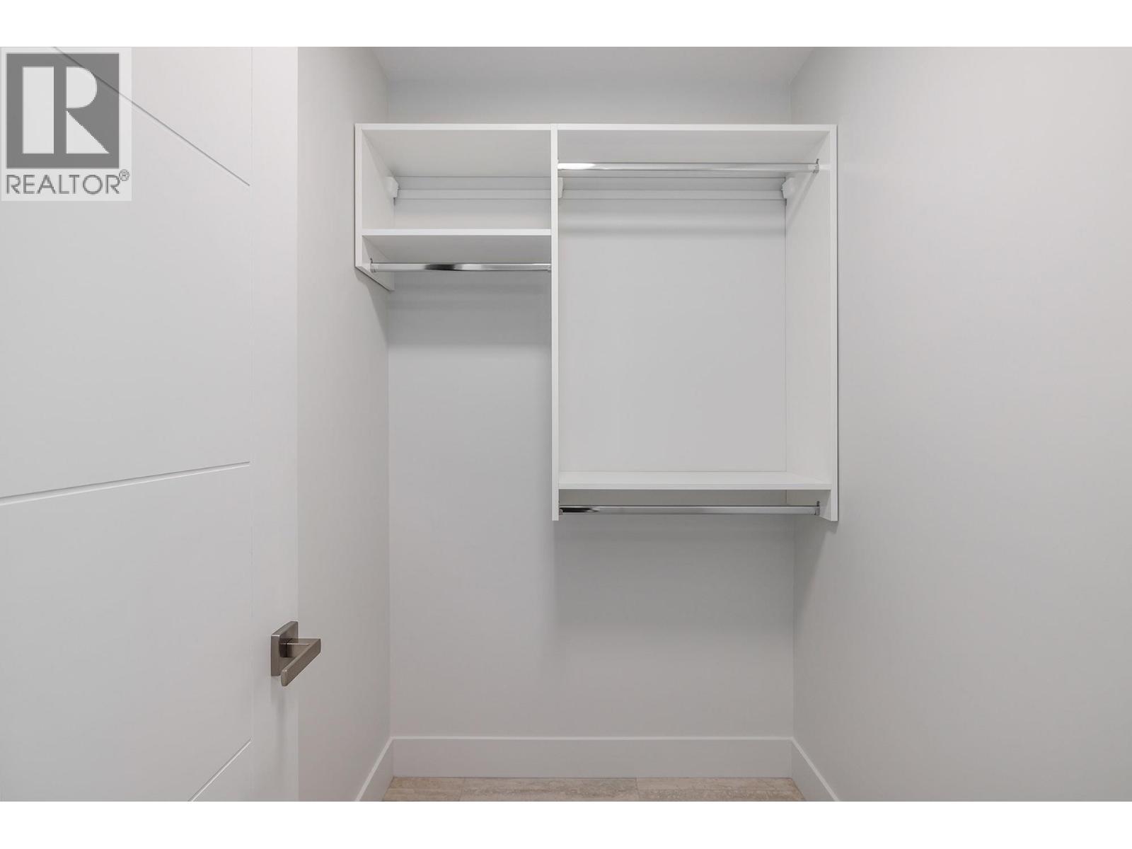 Walk in closet off mudroom - 789 Carleton Street, Kelowna, BC - Indoor With Storage
