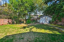 Backyard with detached work shop -