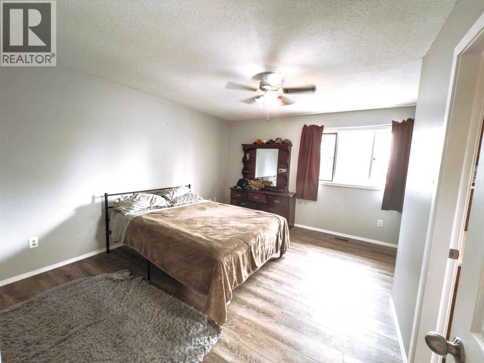6497 Grey Crescent, Horse Lake, BC - Indoor Photo Showing Bedroom