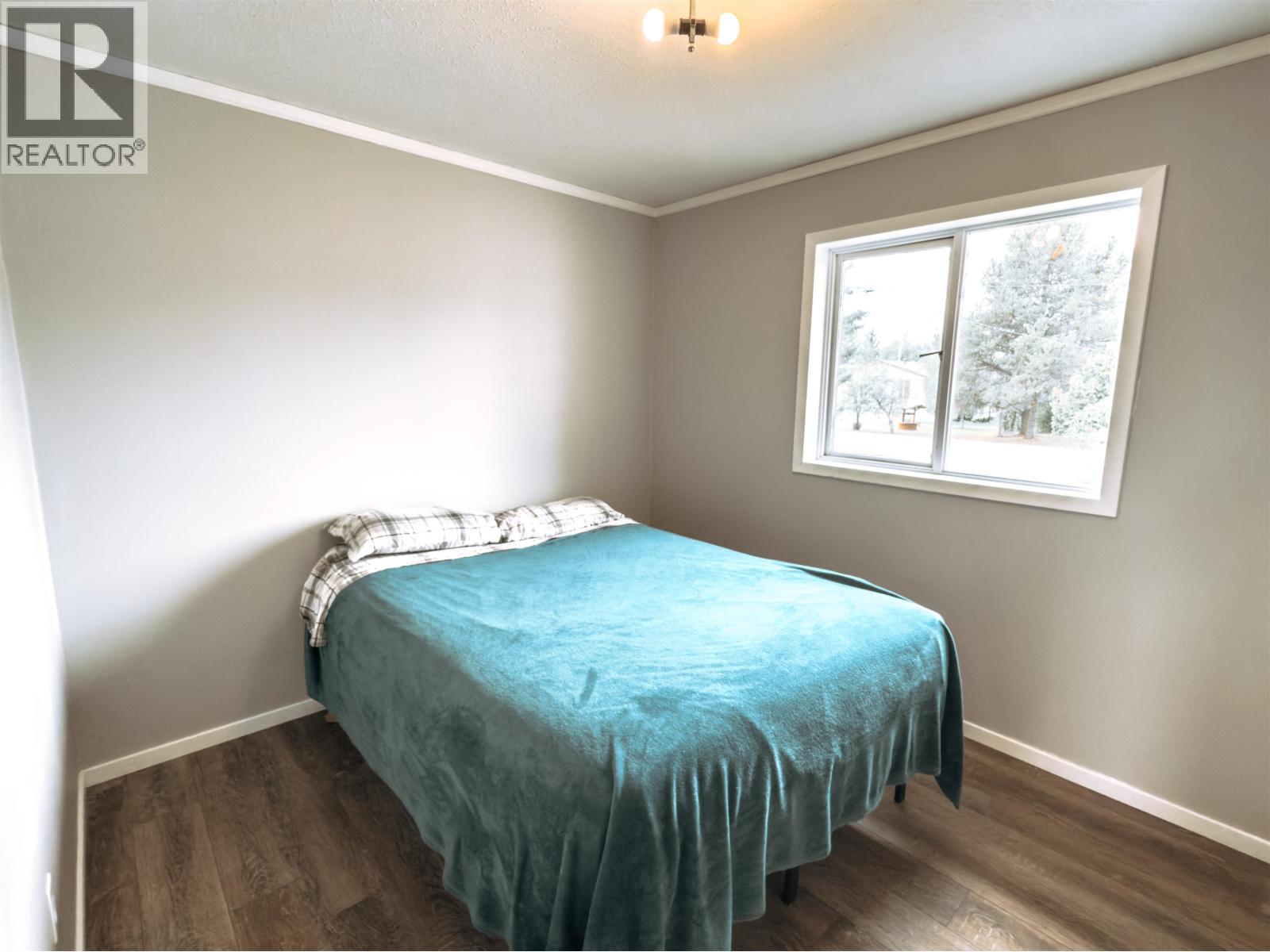 6497 Grey Crescent, Horse Lake, BC - Indoor Photo Showing Bedroom