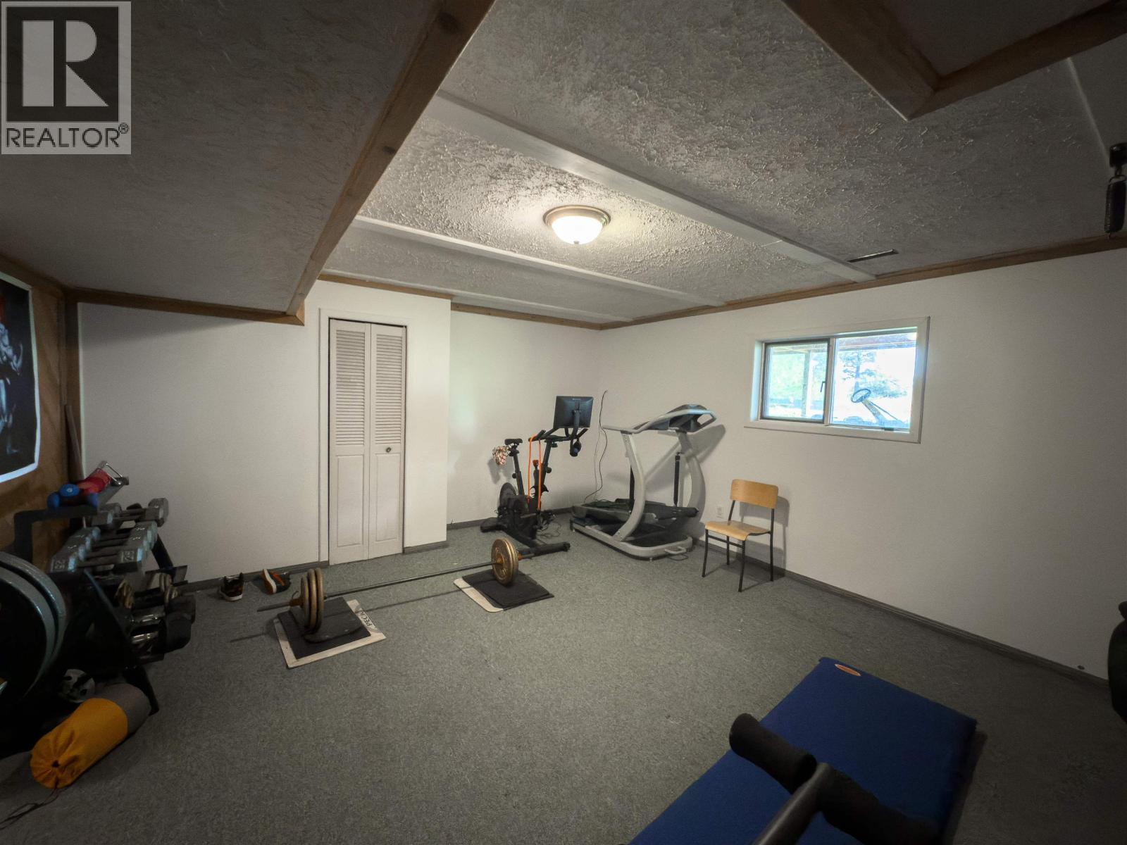6497 Grey Crescent, Horse Lake, BC - Indoor Photo Showing Gym Room