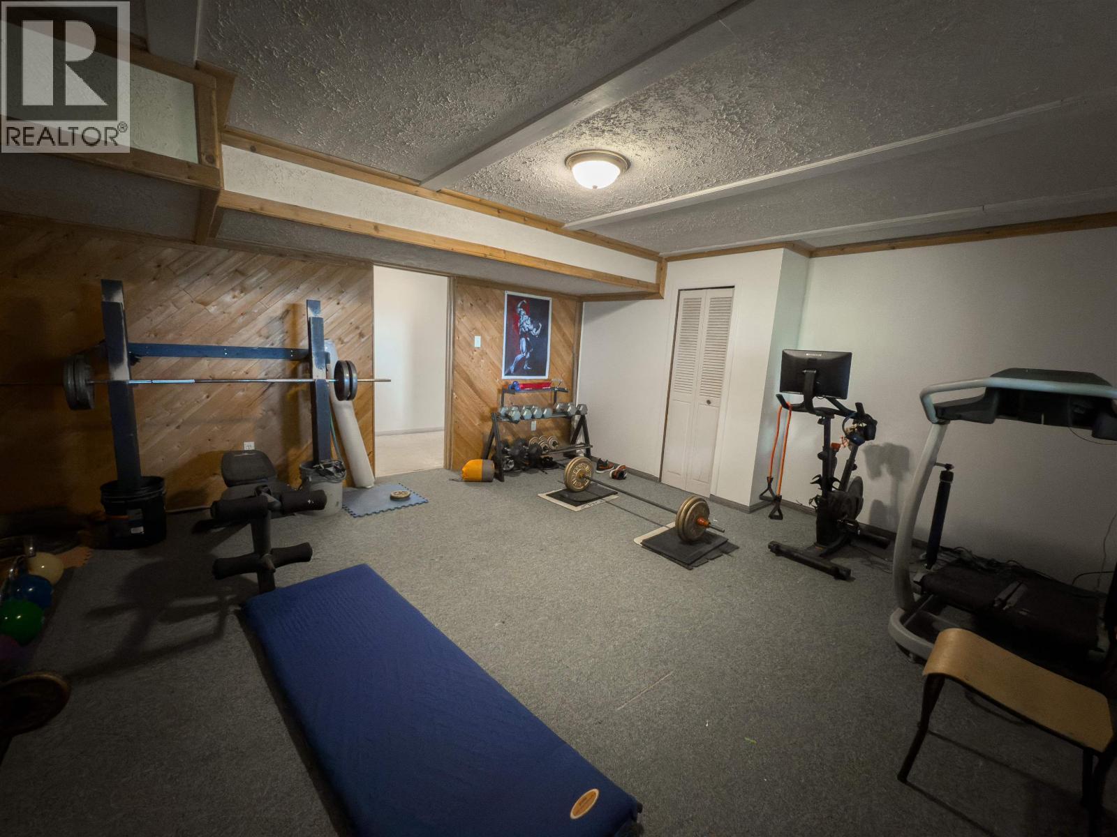 6497 Grey Crescent, Horse Lake, BC - Indoor Photo Showing Gym Room