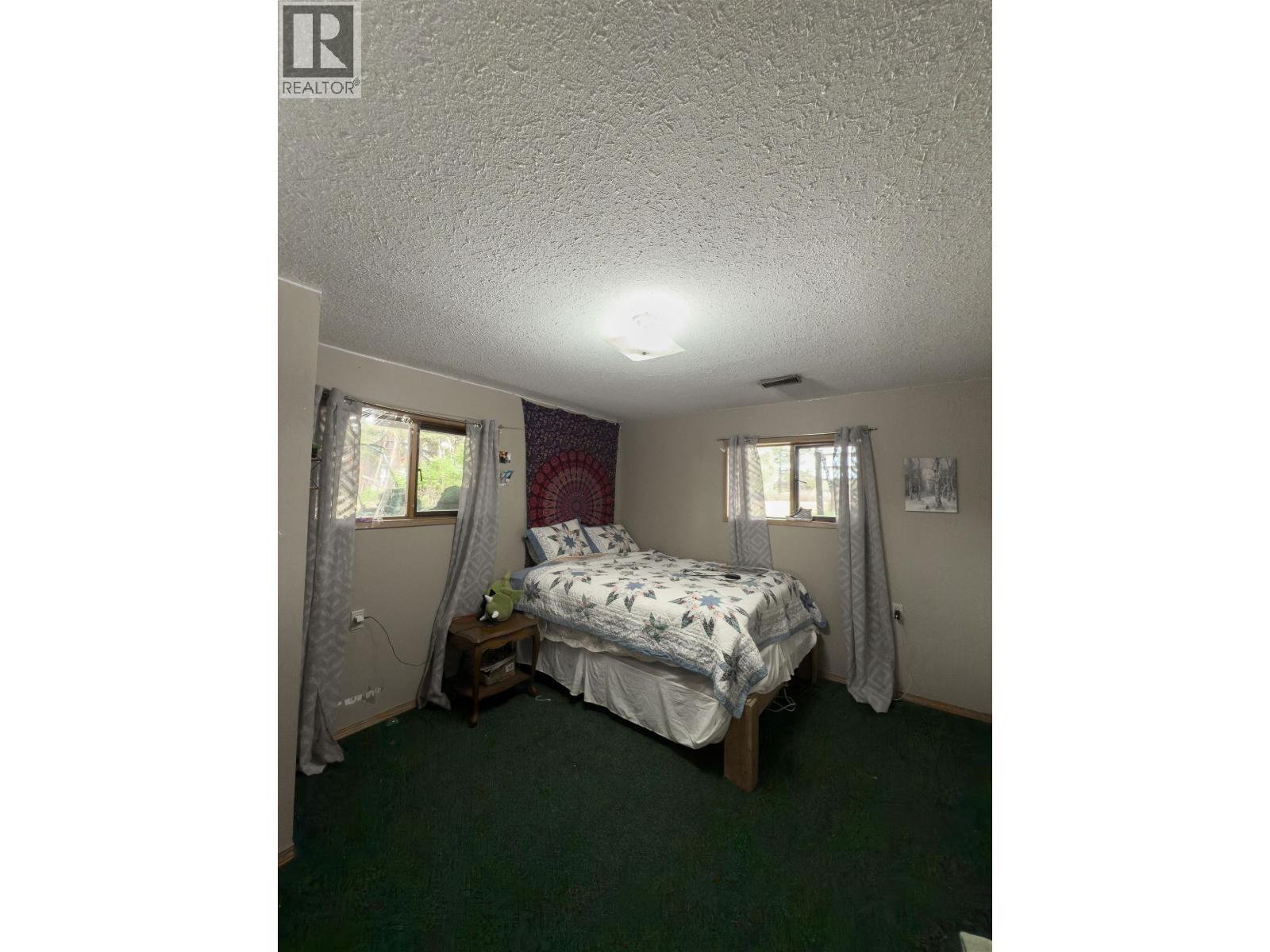 6497 Grey Crescent, Horse Lake, BC - Indoor Photo Showing Bedroom