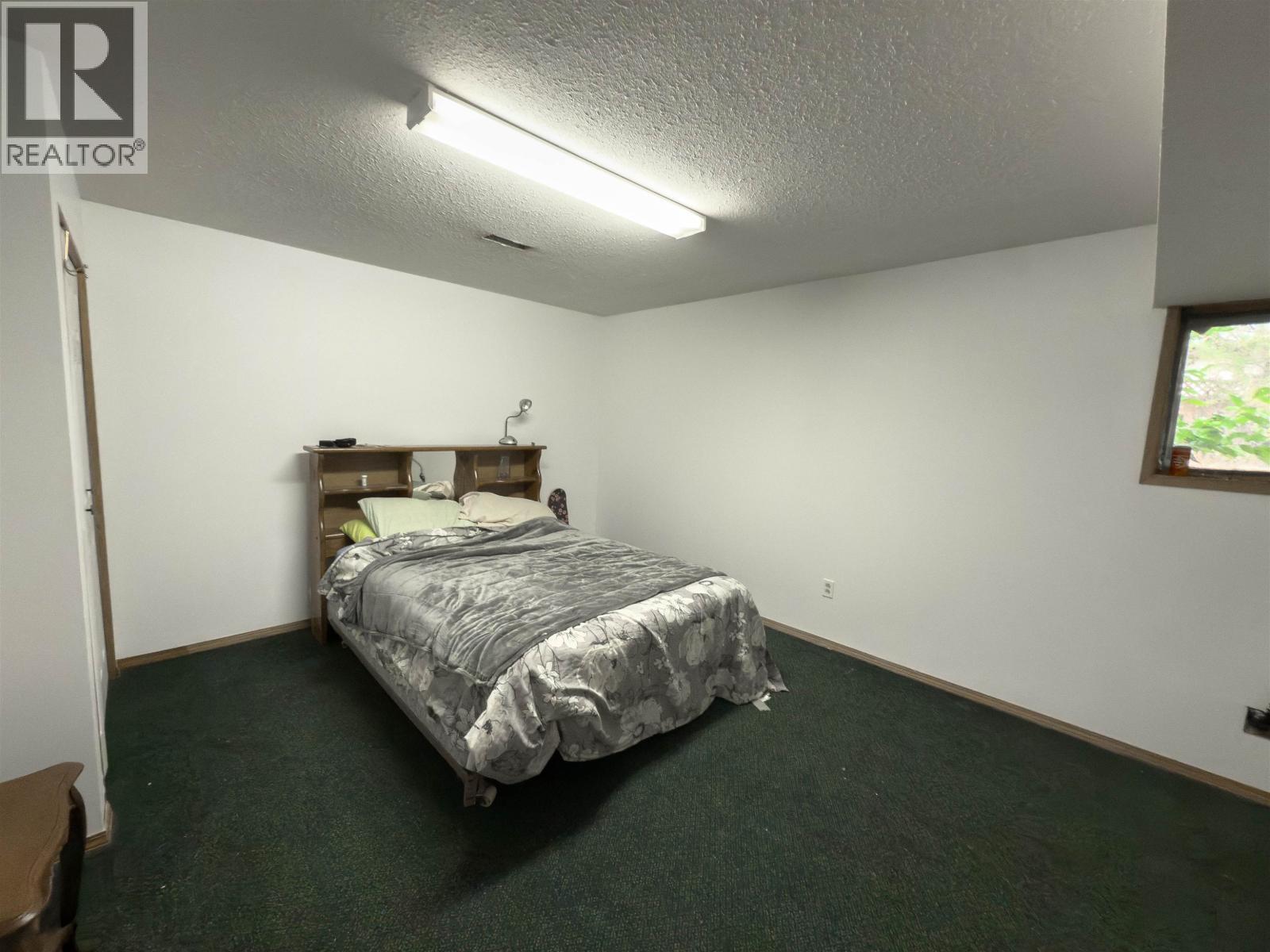 6497 Grey Crescent, Horse Lake, BC - Indoor Photo Showing Bedroom