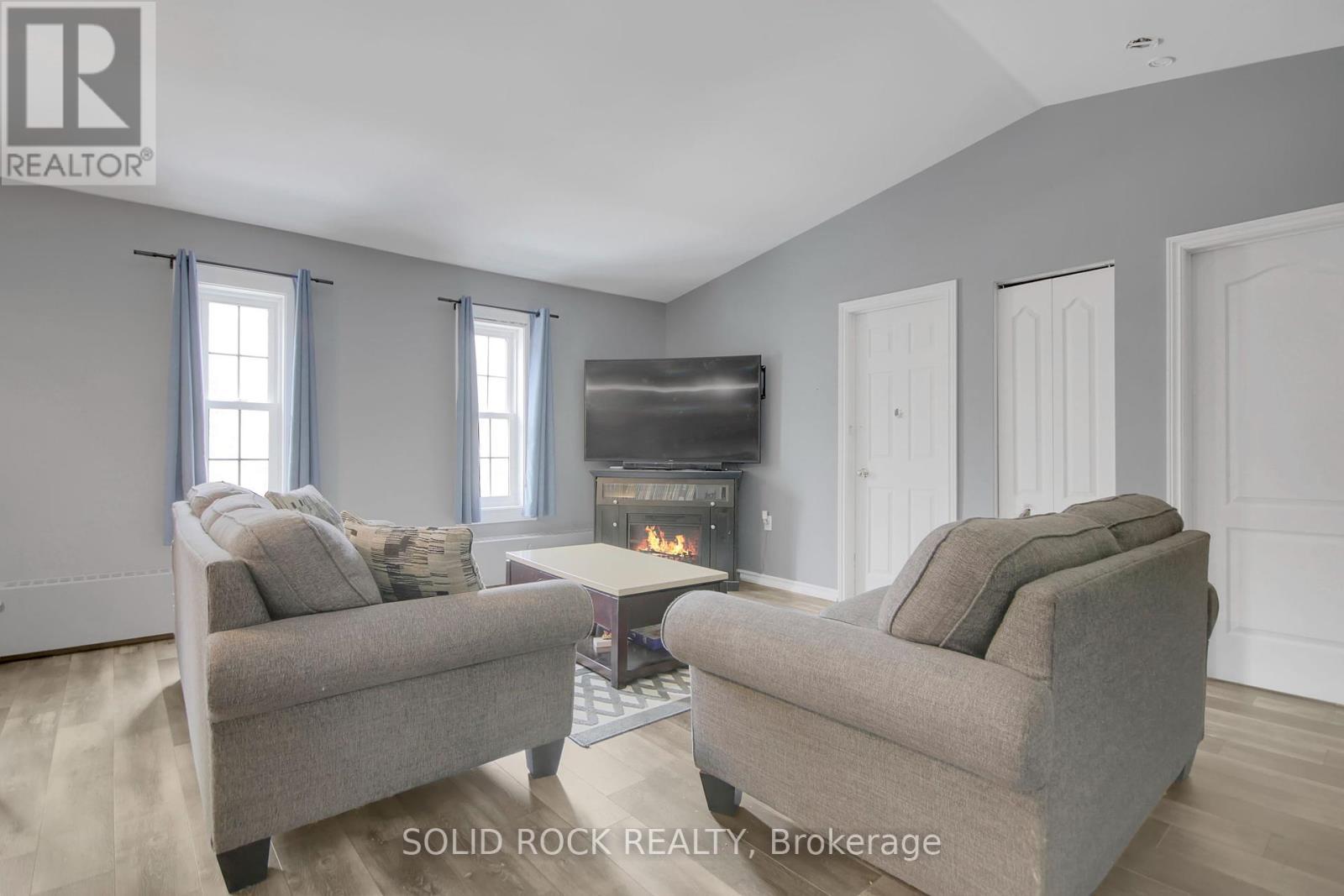 2855A Highway 132 Road, Admaston/Bromley, ON - Indoor Photo Showing Living Room With Fireplace