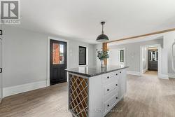 Side door to deck/yard/driveway -