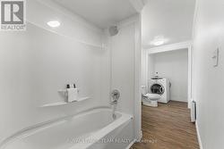Bathroom with laundry -