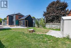 Attached storage shed -