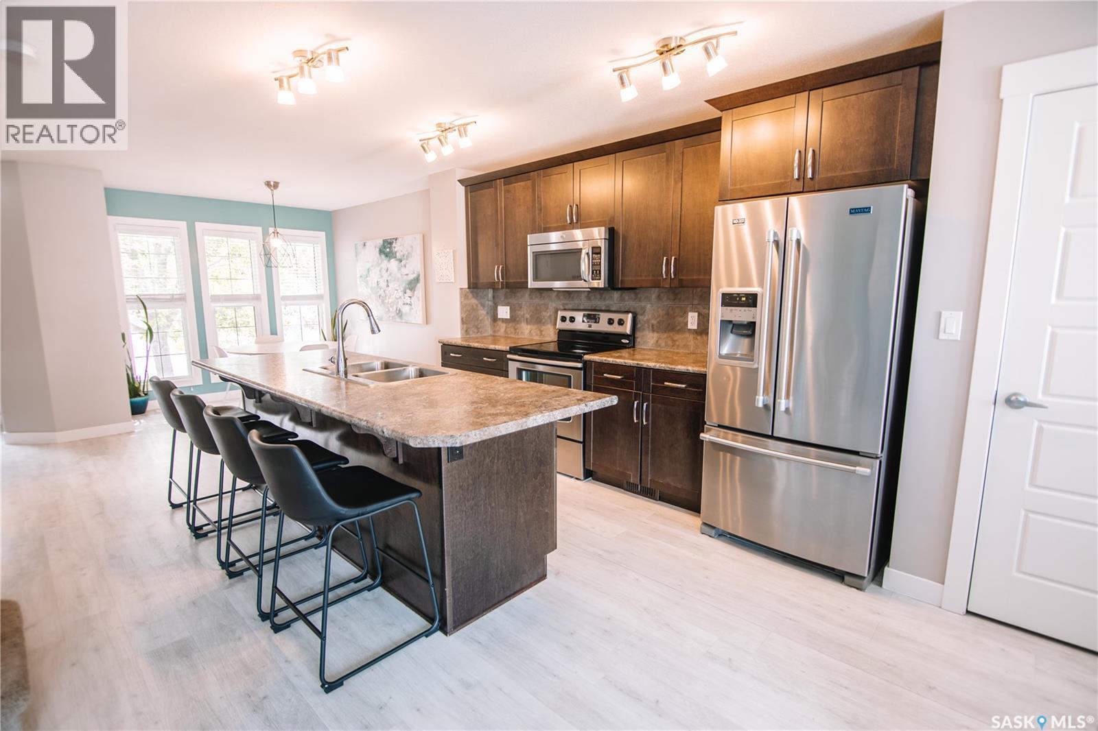 2842 Elgaard Drive, Regina, SK - Indoor Photo Showing Kitchen With Double Sink With Upgraded Kitchen