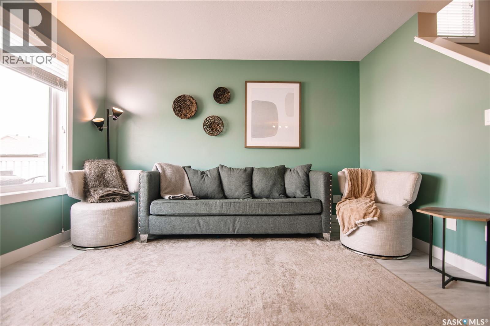 2842 Elgaard Drive, Regina, SK - Indoor Photo Showing Living Room