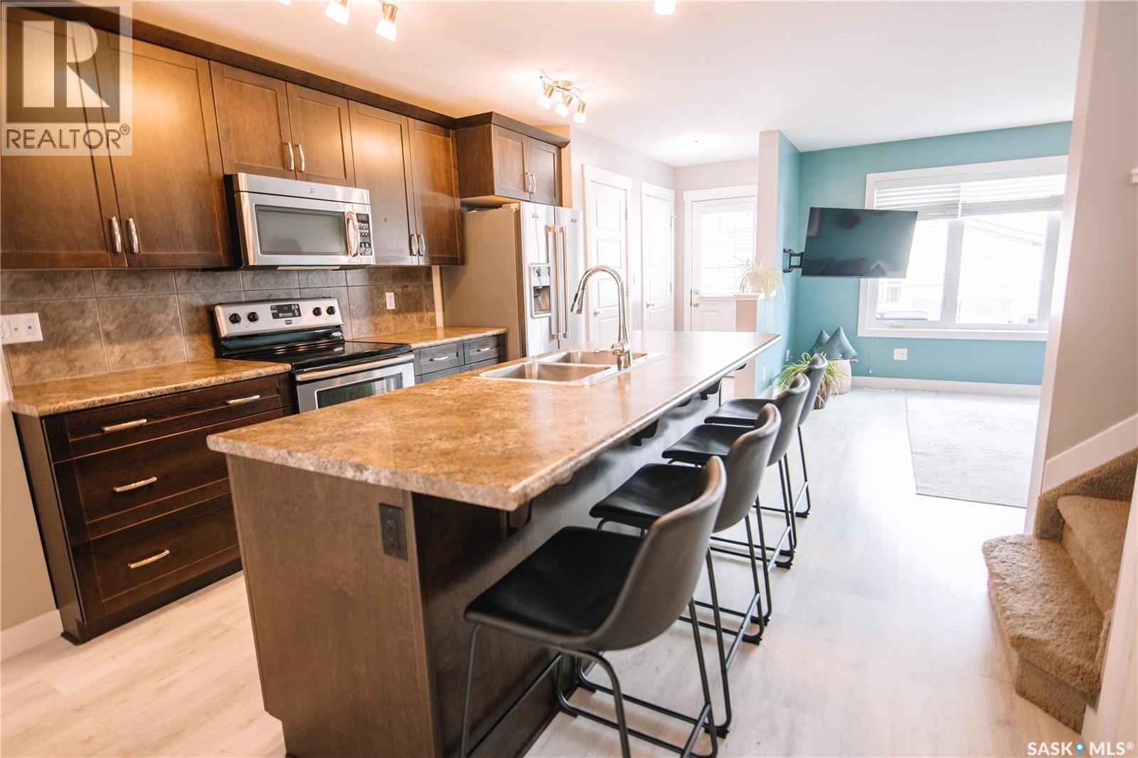2842 Elgaard Drive, Regina, SK - Indoor Photo Showing Kitchen With Double Sink