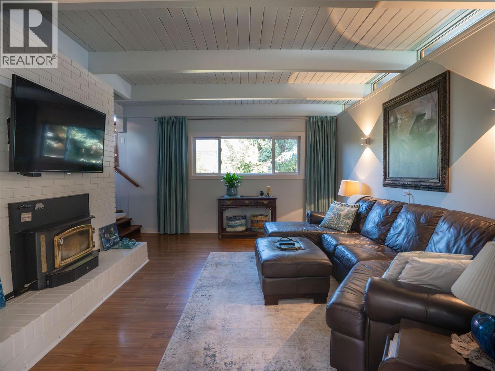 Living Room - 1618 Duncan Ave E Avenue, Penticton, BC - Indoor Photo Showing Living Room With Fireplace