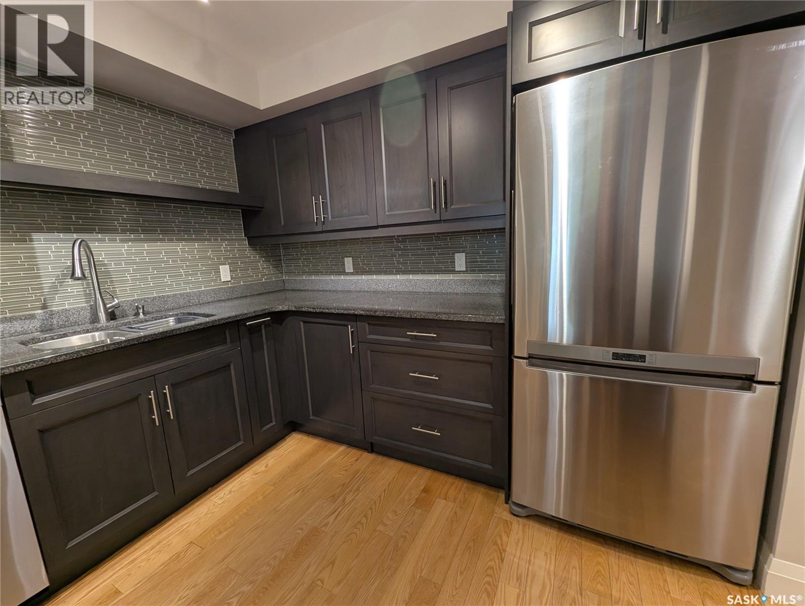 204 921 Main Street, Saskatoon, SK - Indoor Photo Showing Kitchen With Double Sink