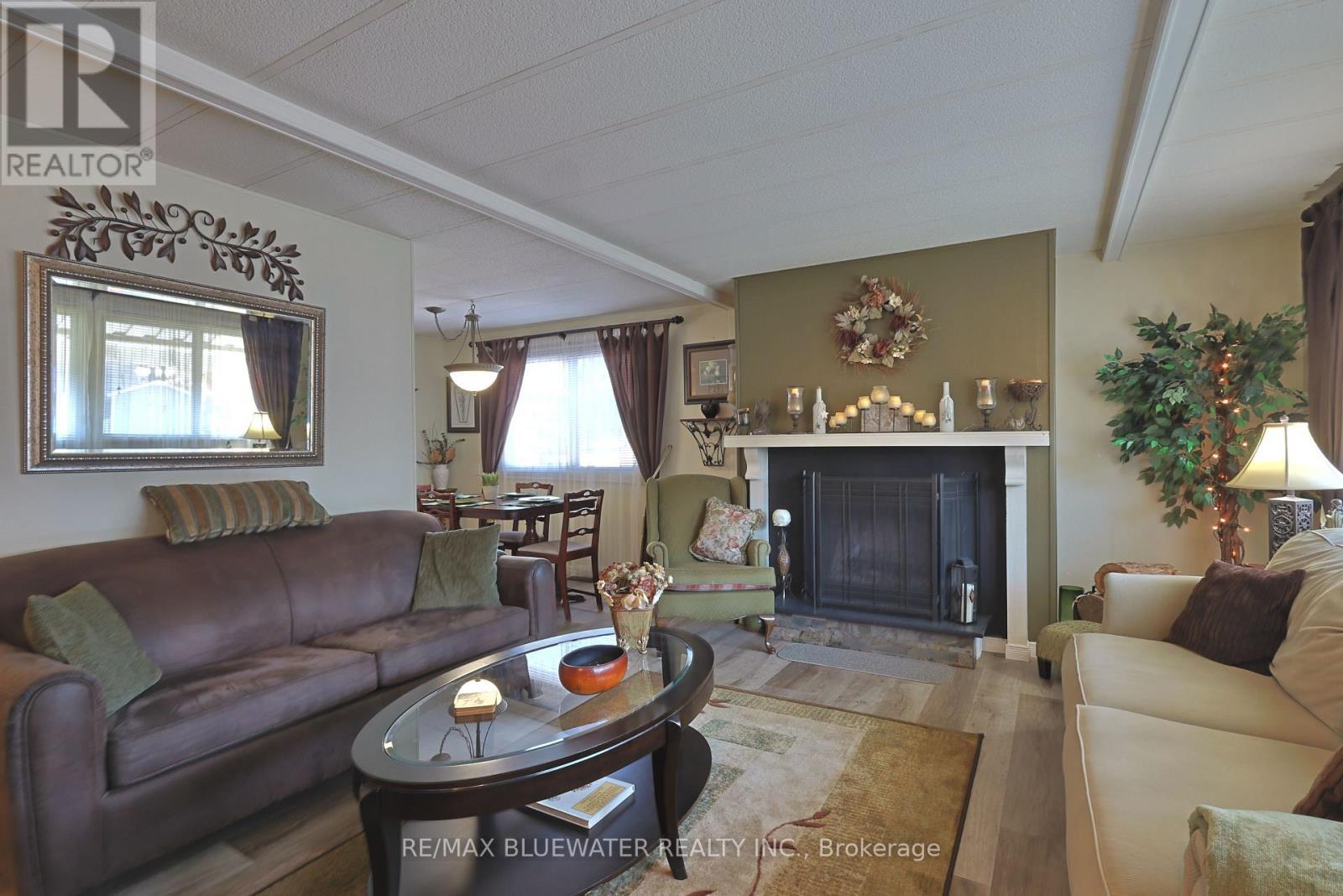 208 Biltmore Drive, South Huron (Stephen), ON - Indoor Photo Showing Living Room With Fireplace