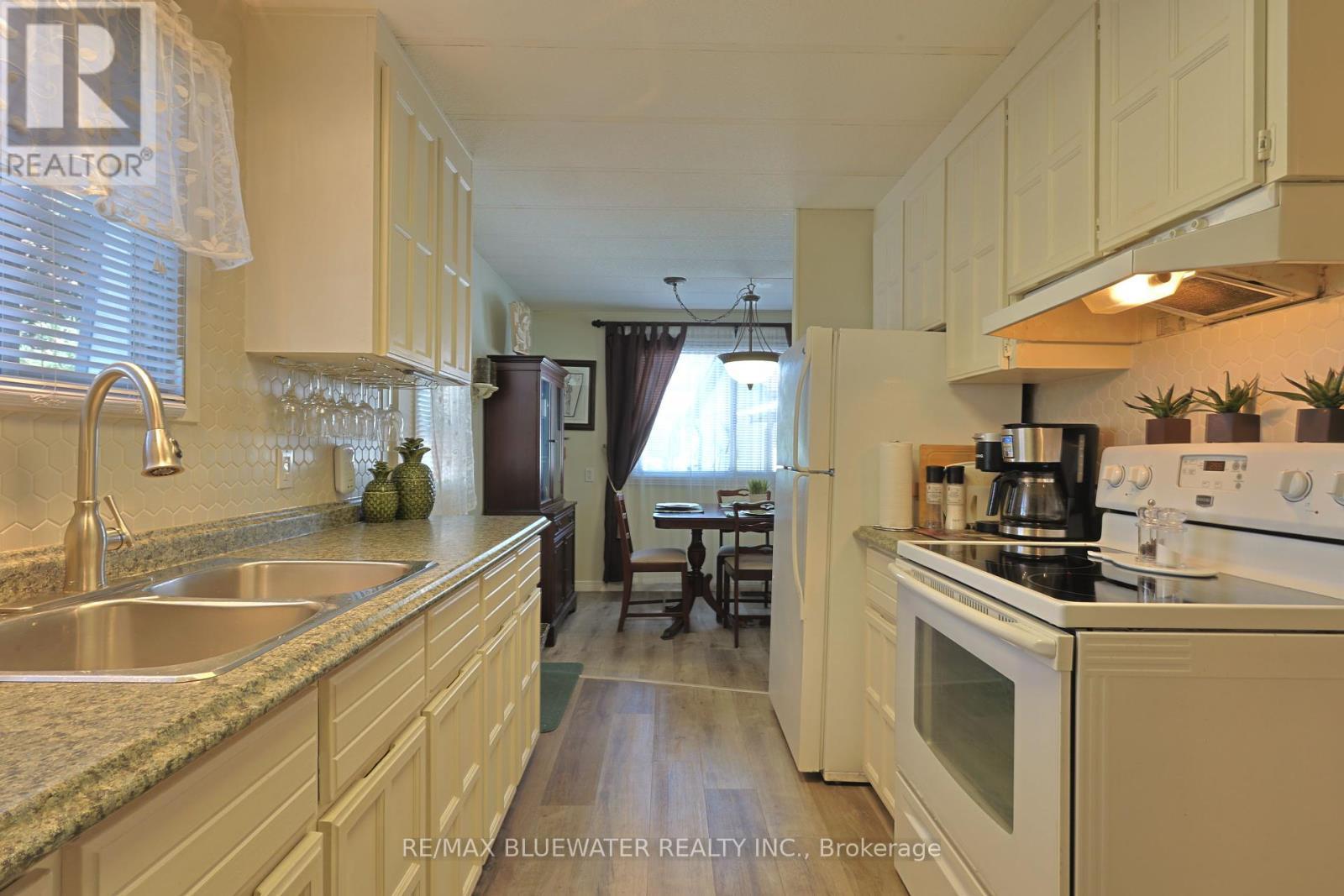 208 Biltmore Drive, South Huron (Stephen), ON - Indoor Photo Showing Kitchen With Double Sink