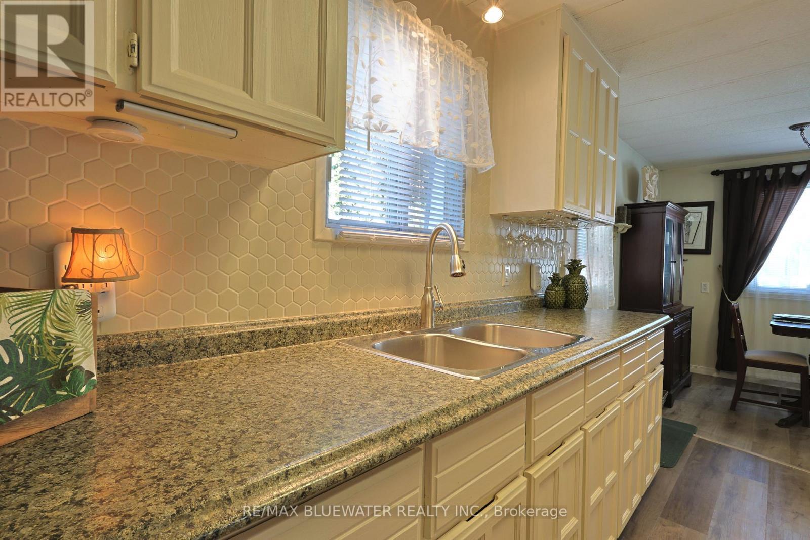 208 Biltmore Drive, South Huron (Stephen), ON - Indoor Photo Showing Kitchen With Double Sink