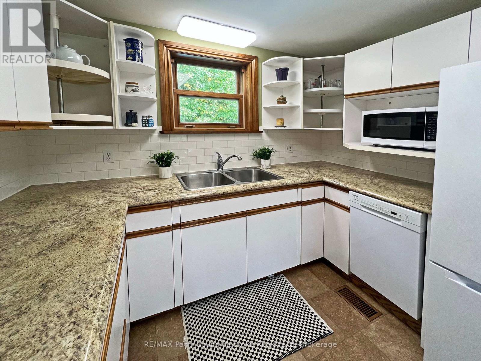 159 Boundary Spur Road, Whitestone (Dunchurch), ON - Indoor Photo Showing Kitchen With Double Sink