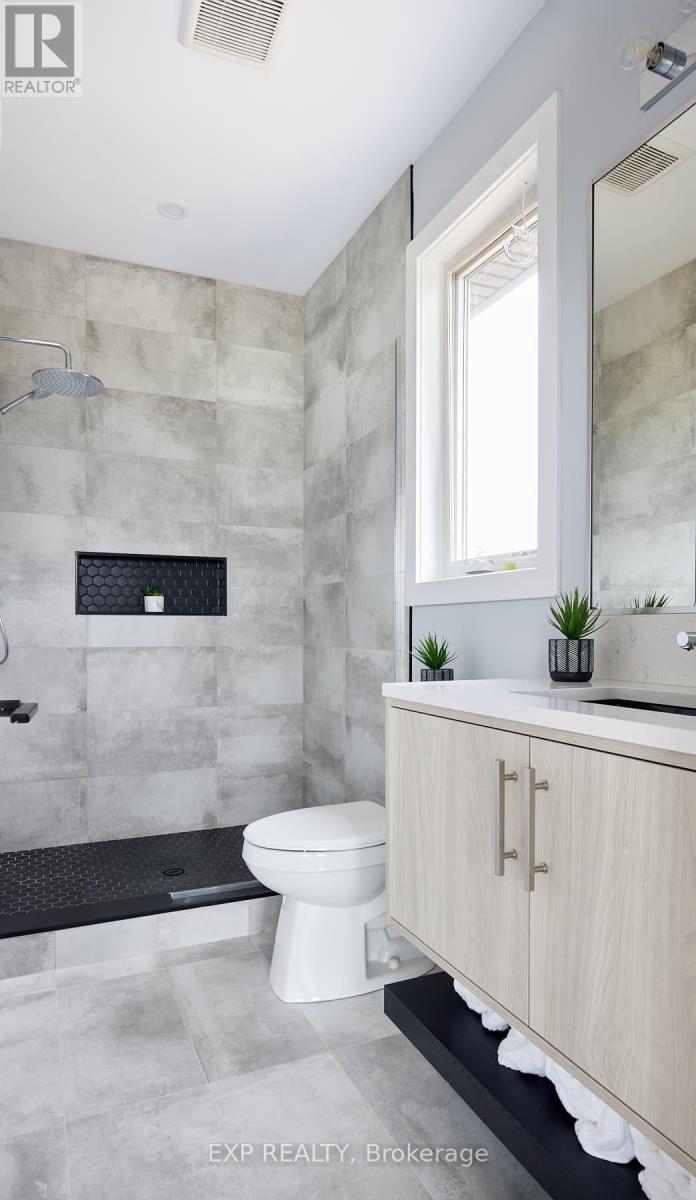 photos may show other models & upgrades - 205 Merritt Court, North Middlesex (Parkhill), ON - Indoor Photo Showing Bathroom