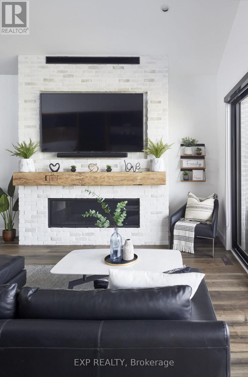 photos may show other models & upgrades - 205 Merritt Court, North Middlesex (Parkhill), ON - Indoor Photo Showing Living Room