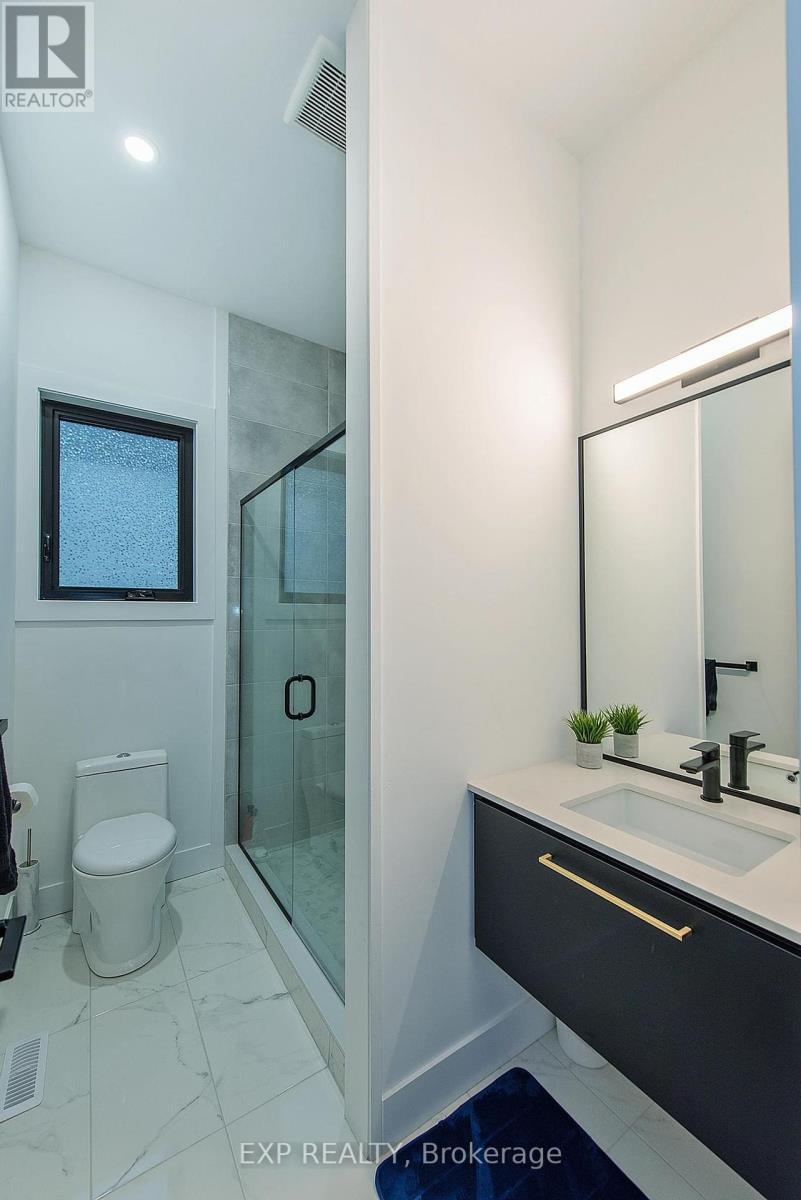 photos may show other models & upgrades - 205 Merritt Court, North Middlesex (Parkhill), ON - Indoor Photo Showing Bathroom