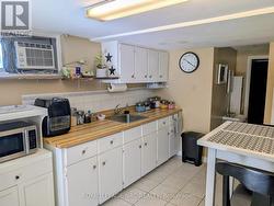 Lower level kitchen view 2 -