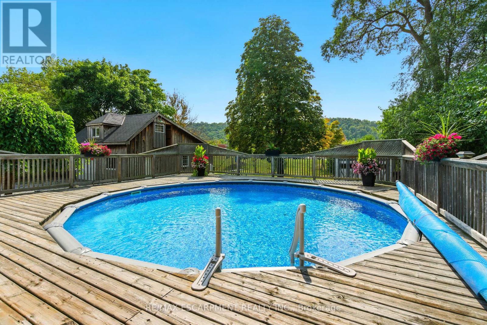 908 Highway 8, Hamilton, ON - Outdoor With Above Ground Pool With Backyard