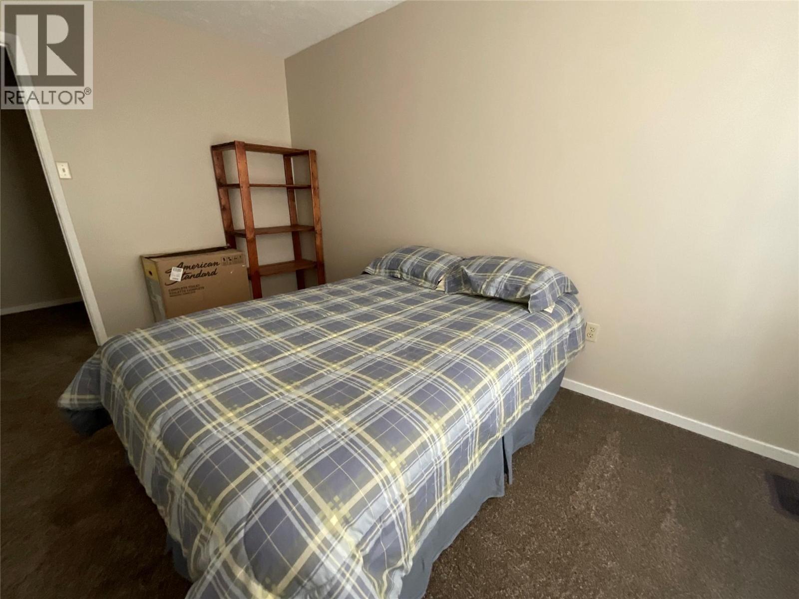 64 Merrick Place, Tumbler Ridge, BC - Indoor Photo Showing Bedroom