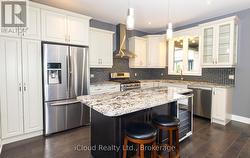 Kitchen Features Granite Counters, S/S Appliances -