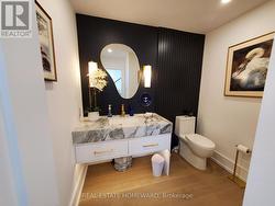 3rd Bathroom- powder rm at entrance -