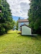 Gentle slope in back, leads to lower unit entry. -