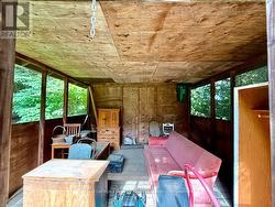 Interior of screened-in gazebo. -