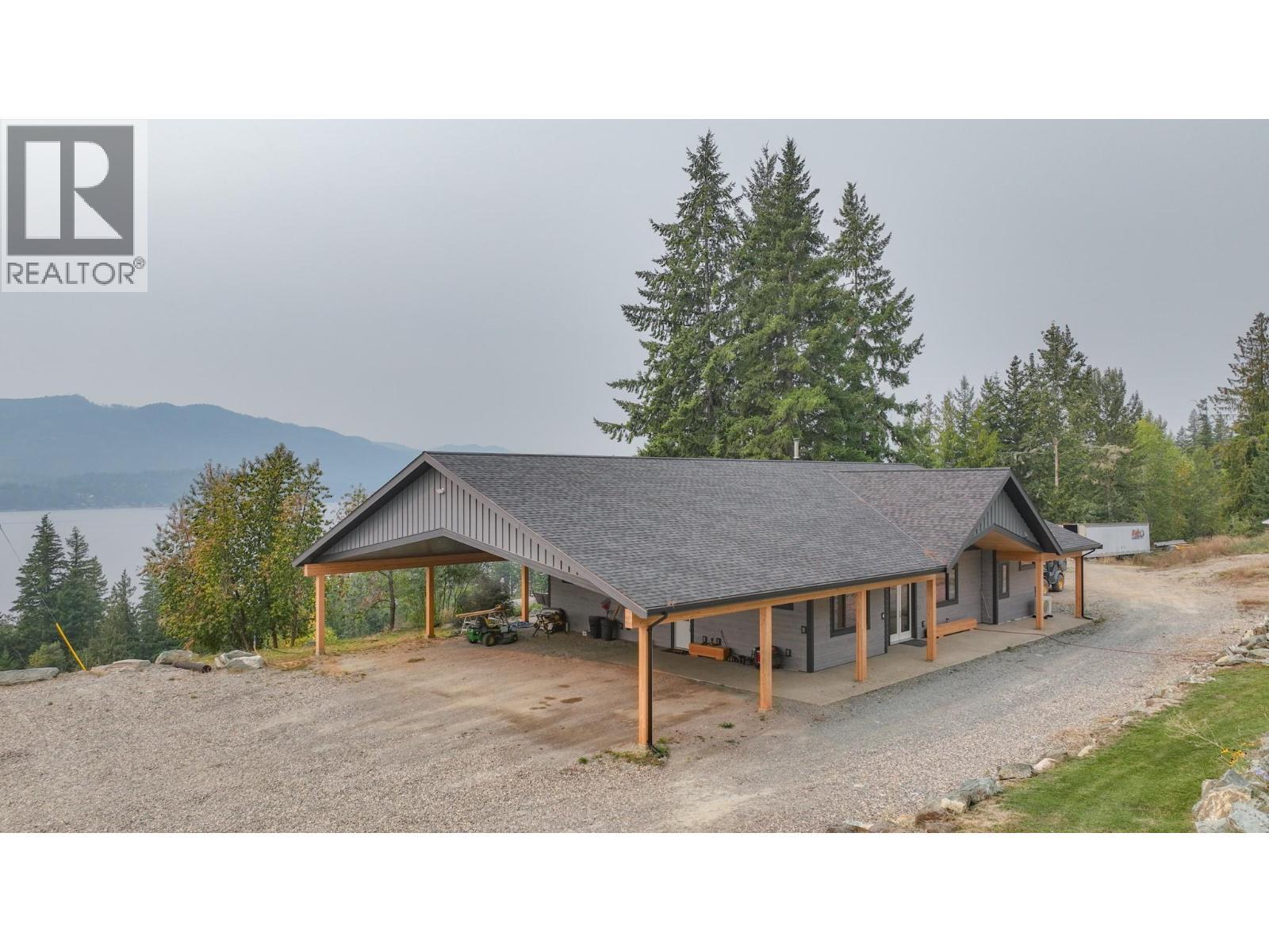 7500 Lonneke Trail, Anglemont, BC - Outdoor With Body Of Water