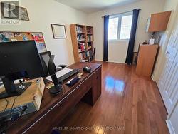 One of the upstairs bedrooms used as an office -