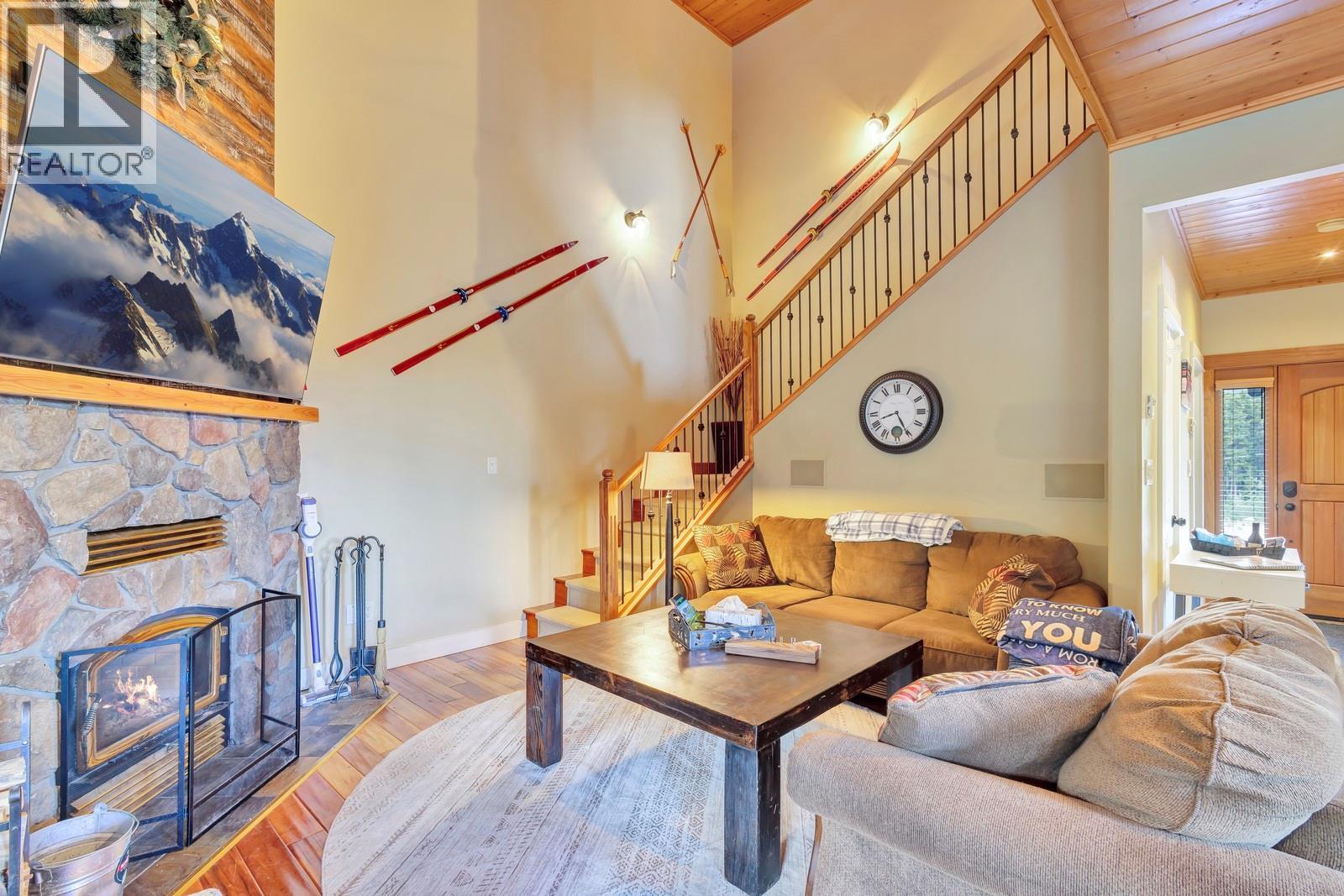 1211 Apex Mountain Road Unit# 1, Penticton, BC - Indoor Photo Showing Living Room With Fireplace