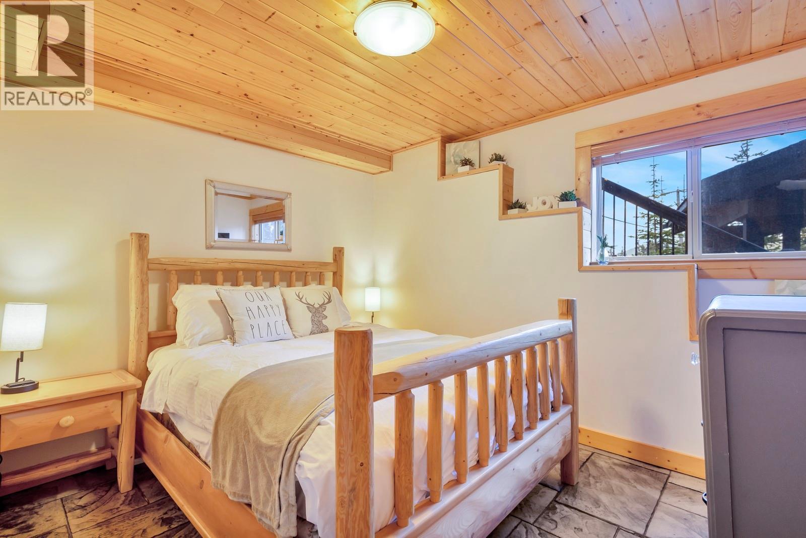 1211 Apex Mountain Road Unit# 1, Penticton, BC - Indoor Photo Showing Bedroom