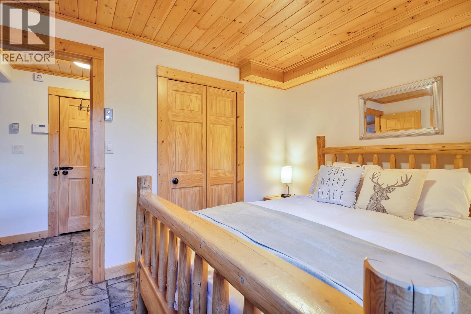 1211 Apex Mountain Road Unit# 1, Penticton, BC - Indoor Photo Showing Bedroom