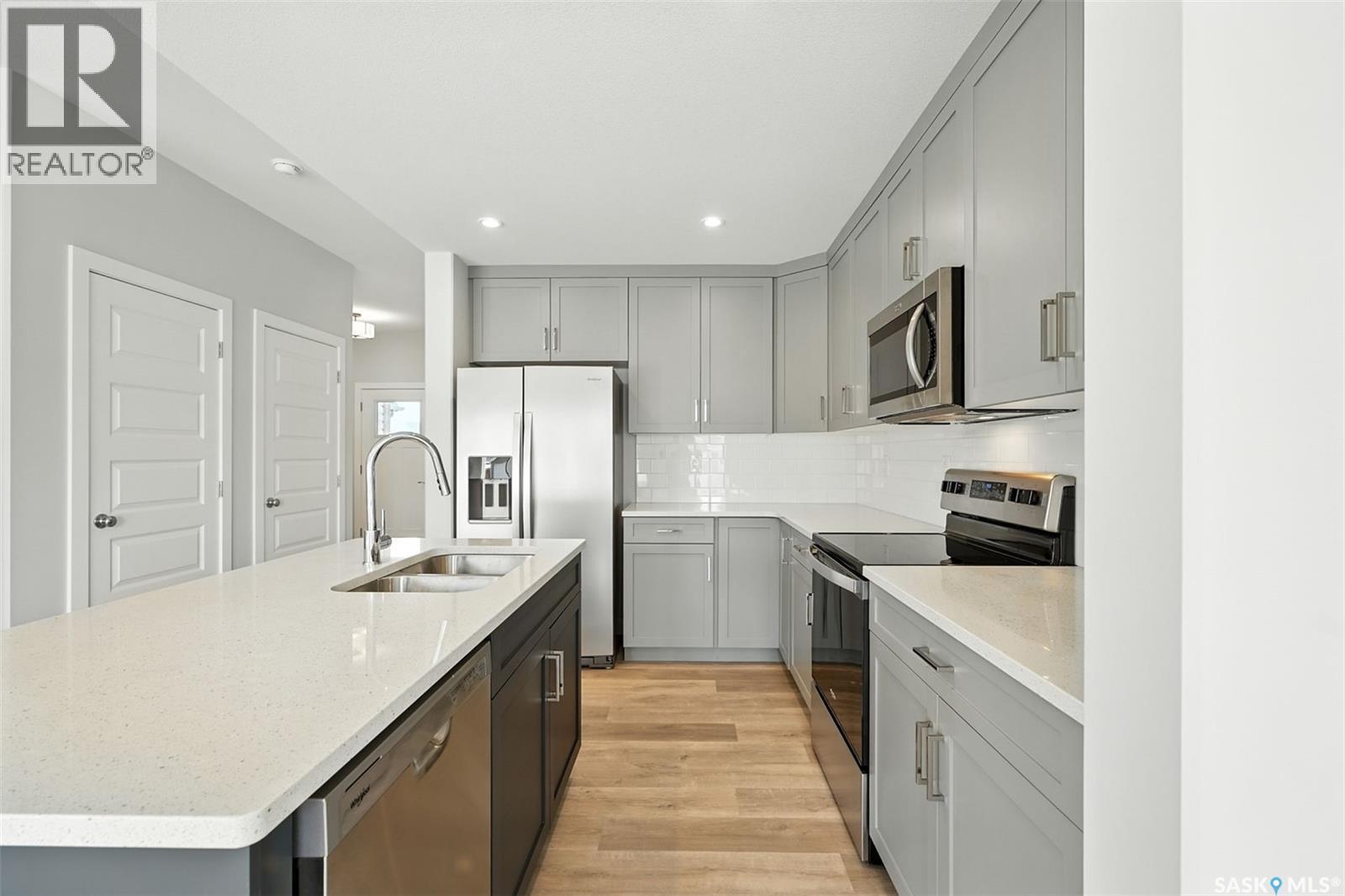512 Myles Heidt Manor, Saskatoon, SK - Indoor Photo Showing Kitchen With Double Sink With Upgraded Kitchen
