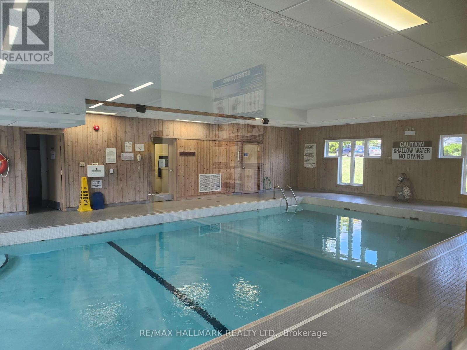 8 Greenfield Place, Wilmot, ON - Indoor Photo Showing Other Room With In Ground Pool