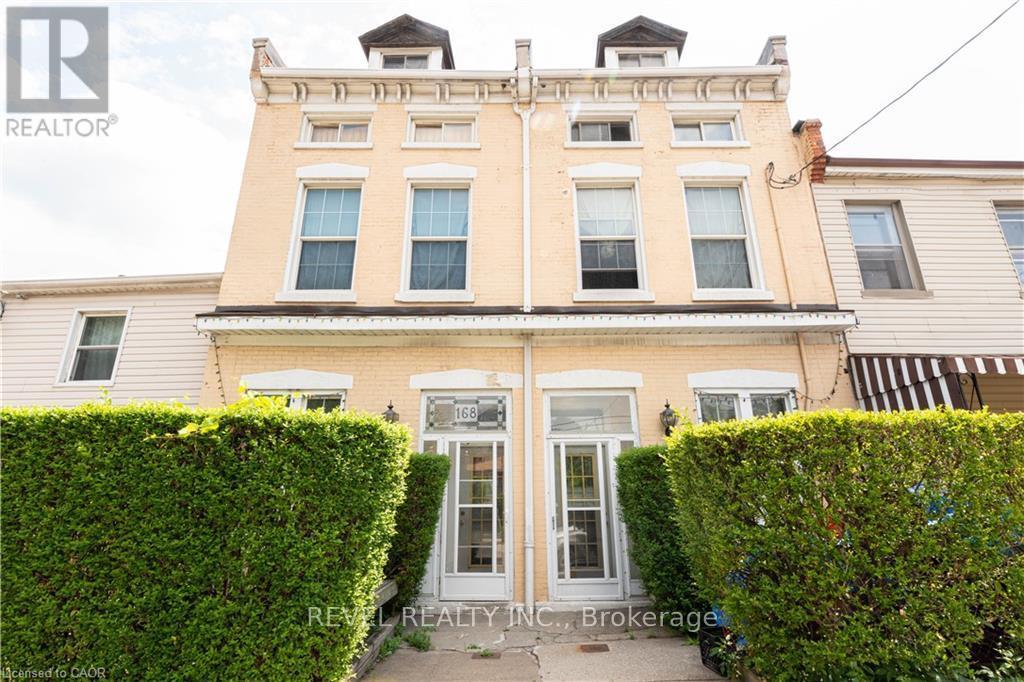 166-168 Macnab Street N, Hamilton, ON - Outdoor With Facade