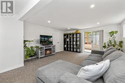 Family room w walkout to Sunroom -