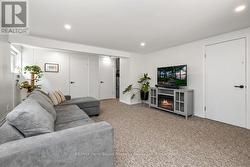 Spacious family room w LED pot lighting -